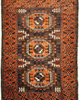 Antique Original Baluch with 3 Medallions and Unique Knotted Ends. An Afghan piece of original genuine woven carpet art sold by Santa Barbara Design Center.