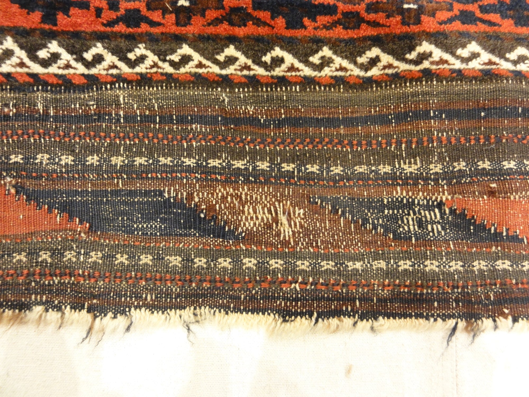 Antique Camelhair Persian Beluch Circa 1900s. A piece of genuine and authentic woven carpet art from Santa Barbara Design Center Rugs and More.