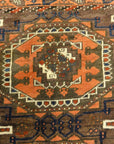 Antique Original Baluch with 3 Medallions and Unique Knotted Ends. An Afghan piece of original genuine woven carpet art sold by Santa Barbara Design Center.