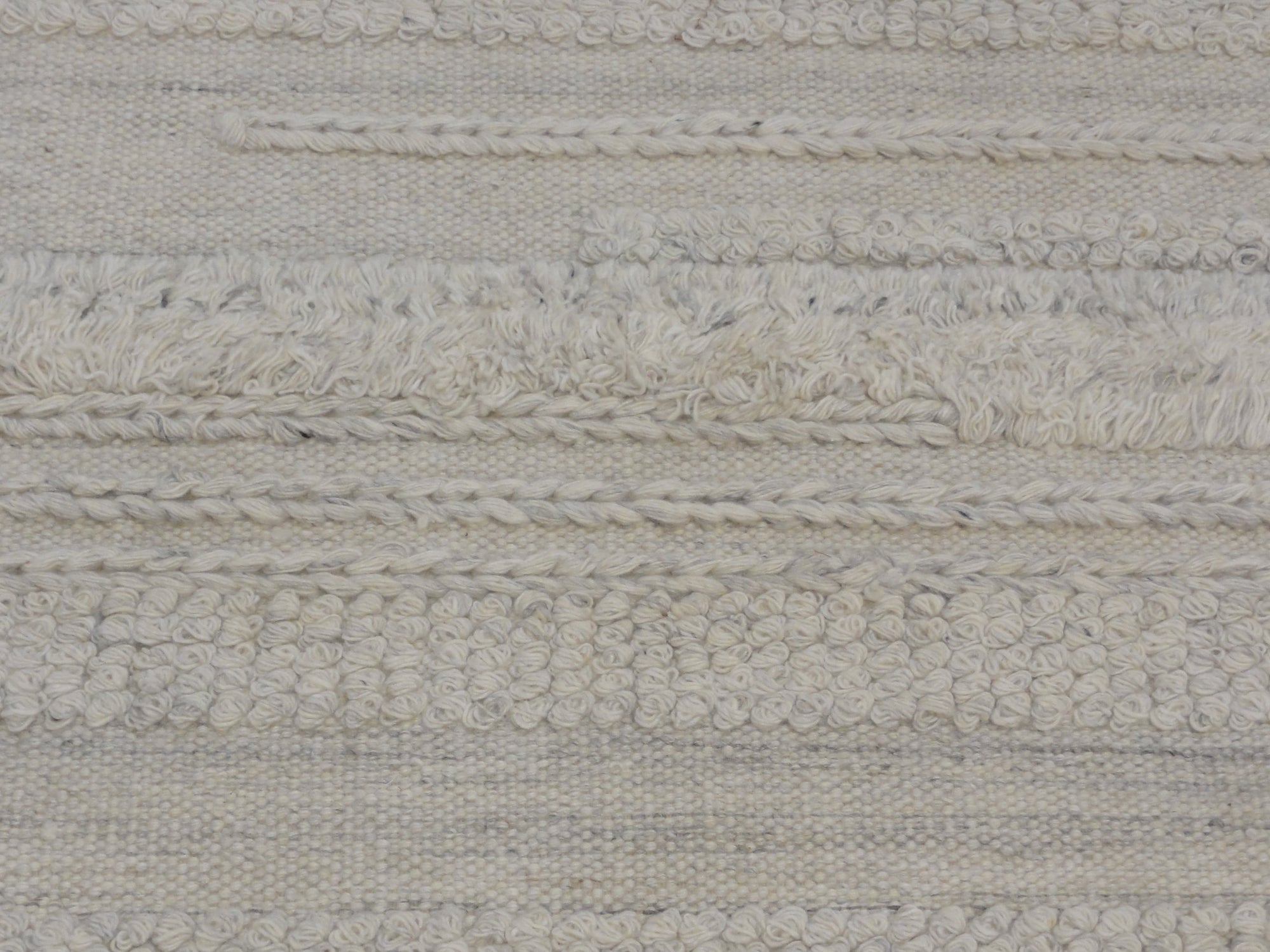 Close-up view of Ziegler & Co Montecito Vibe rug showcasing a textured, woven pattern in neutral tones.