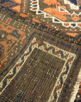 Antique Original Baluch with 3 Medallions and Unique Knotted Ends. An Afghan piece of original genuine woven carpet art sold by Santa Barbara Design Center.