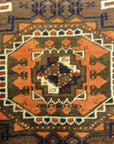 Antique Original Baluch with 3 Medallions and Unique Knotted Ends. An Afghan piece of original genuine woven carpet art sold by Santa Barbara Design Center.